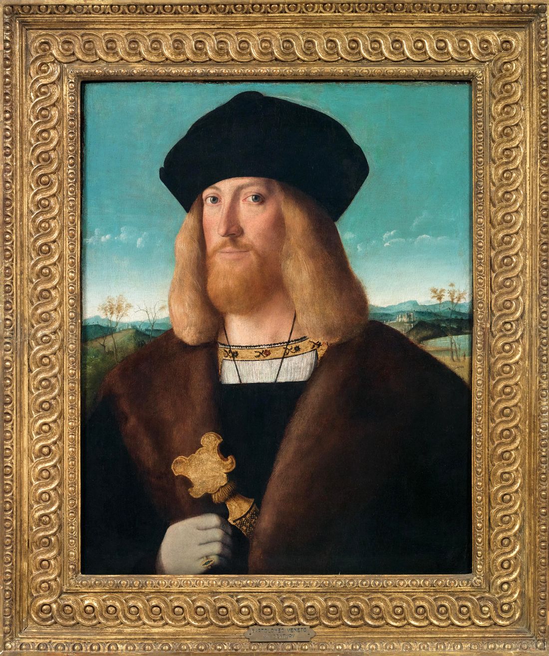 9bartolomeo-veneto-Portrait of a bearded man, half-length, wearing a fur-lined coat and holding a dagger, a landscape beyond,.jpg